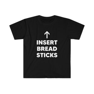 May include: Black t-shirt with white text that reads "Insert Bread Sticks" with an arrow pointing upwards.