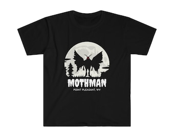 May include: Black t-shirt with a white graphic of Mothman standing in front of a full moon. The text "Mothman" and "Point Pleasant, WV" is below the graphic.