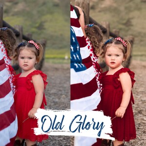 May include: Two young girls wearing red dresses and red, white, and blue headbands stand in front of an American flag. The text "Old Glory" is written in blue on a white background.