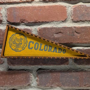 Framed 1950s University of Colorado Buffaloes Vintage NCAA Mini Pennant- Authentic Collegiate Sports Memorabilia