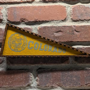 Framed 1950s University of Colorado Buffaloes Vintage NCAA Mini Pennant- Authentic Collegiate Sports Memorabilia