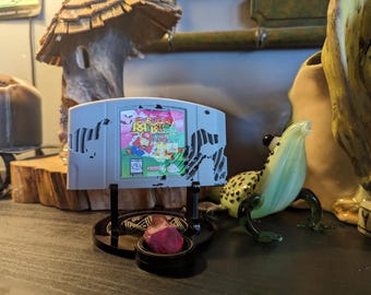 Cursed Retro Relic – Bewitched 64-Bit Artifact with Enchanted Stand