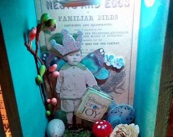 Altered art shadow box night light.