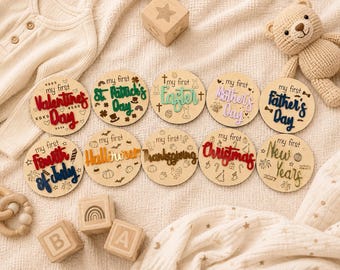 May include: Ten circular wooden milestone markers featuring laser-engraved holiday icons and raised acrylic text for holidays including Valentine's Day, St. Patrick's Day, Easter, Mother's Day, Father's Day, Fourth of July, Halloween, Thanksgiving, Christmas, and New Year's.