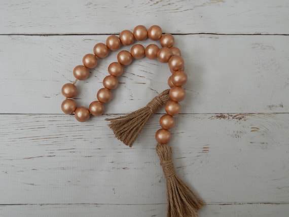 Light copper metallic wood bead garland with beige jute tassels, boho home decor, farmhouse beads