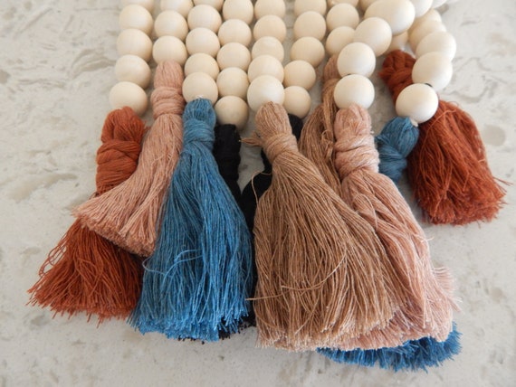 Natural wood bead garland with cotton tassels, boho home decor, jewelry for the home