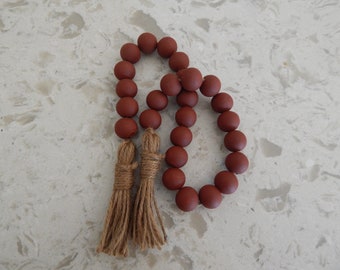 Brick red wood bead garland with jute tassels, boho home decor,  rustic bead garland, farmhouse beads