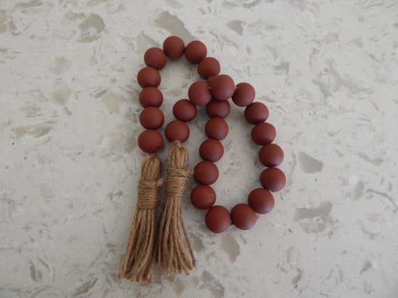 Brick red wood bead garland with jute tassels, boho home decor,  rustic bead garland, farmhouse beads