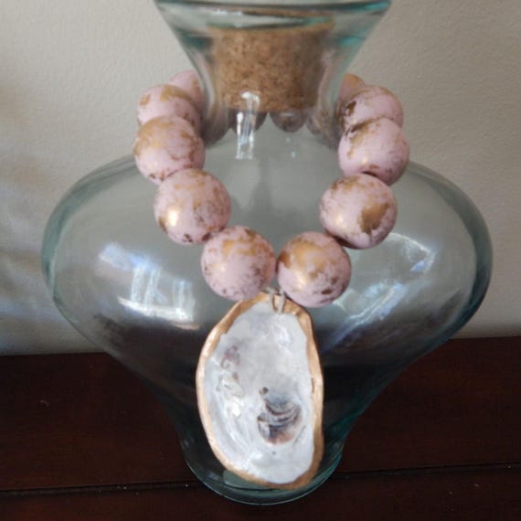 Gold oyster shell with wood beads, shell decor, welcome beads, coastal decor, wood loop garland, pink and gold
