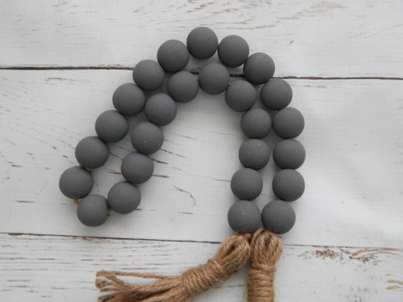 Dark gray wood bead garland with jute tassels, boho home decor, jewelry for the home, rustic bead garland, farmhouse beads