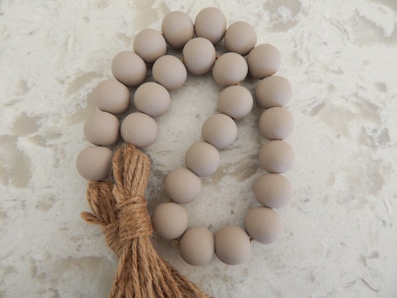 Latte brown wood bead garland with jute tassels, boho home decor, farmhouse beads