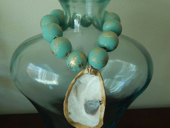 Gold oyster shell with wood beads, shell decor, welcome beads, coastal decor, wood loop garland, dark aqua and gold