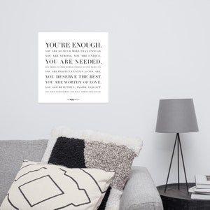 May include: Black and white typography print with the text "You're Enough." The text is in a bold, sans-serif font and is centered on the page. The print is a motivational quote about self-love and acceptance.