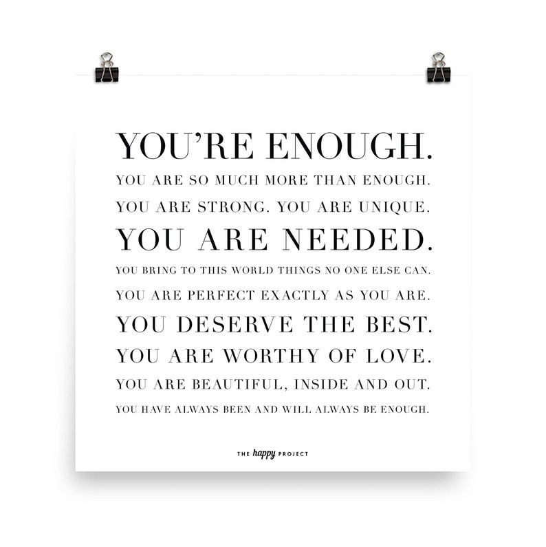 May include: Black and white text on a white background. The text reads "You're Enough." and continues with a series of positive affirmations about self-worth and self-love. The text is centered on the page and is in a bold, sans-serif font. At the bottom of the page, in a smaller font, is the text "The happy project."