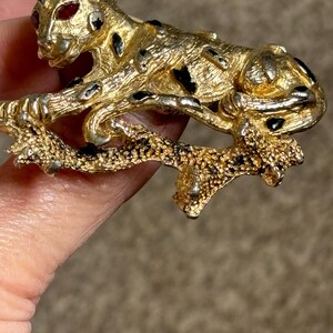 vintage heavy leopard brooch with red eyes