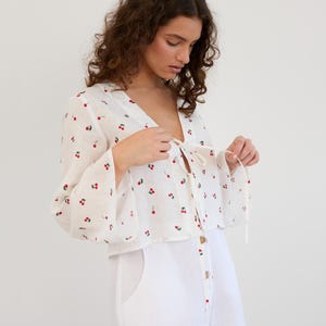 Cherry print linen crop top, tie front, bell sleeves | CASSIDY