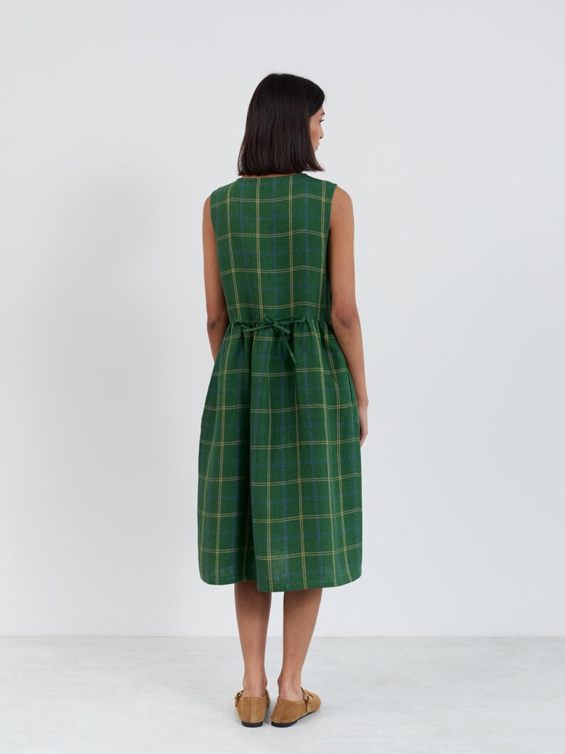 Full-length back view of the FERN Green Check linen midi dress showing the back tie at the gathered waist and clean sleeveless silhouette