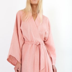 LUNA pink linen kimono robe, bodice detail showing the wrap neckline and tied waist.