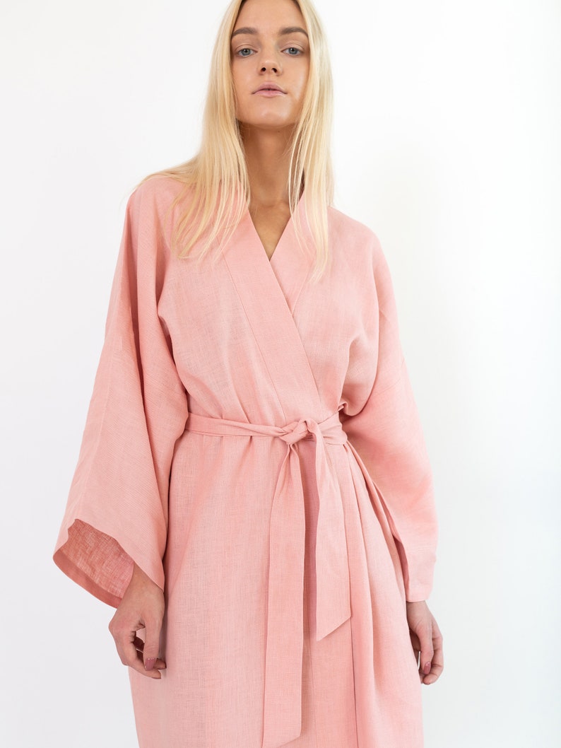 LUNA pink linen kimono robe, bodice detail showing the wrap neckline and tied waist.