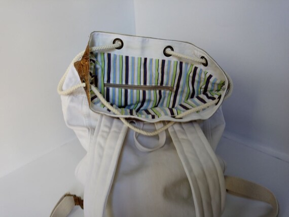 white denim backpack