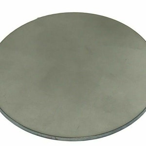 May include: A round, silver-colored metal disc.