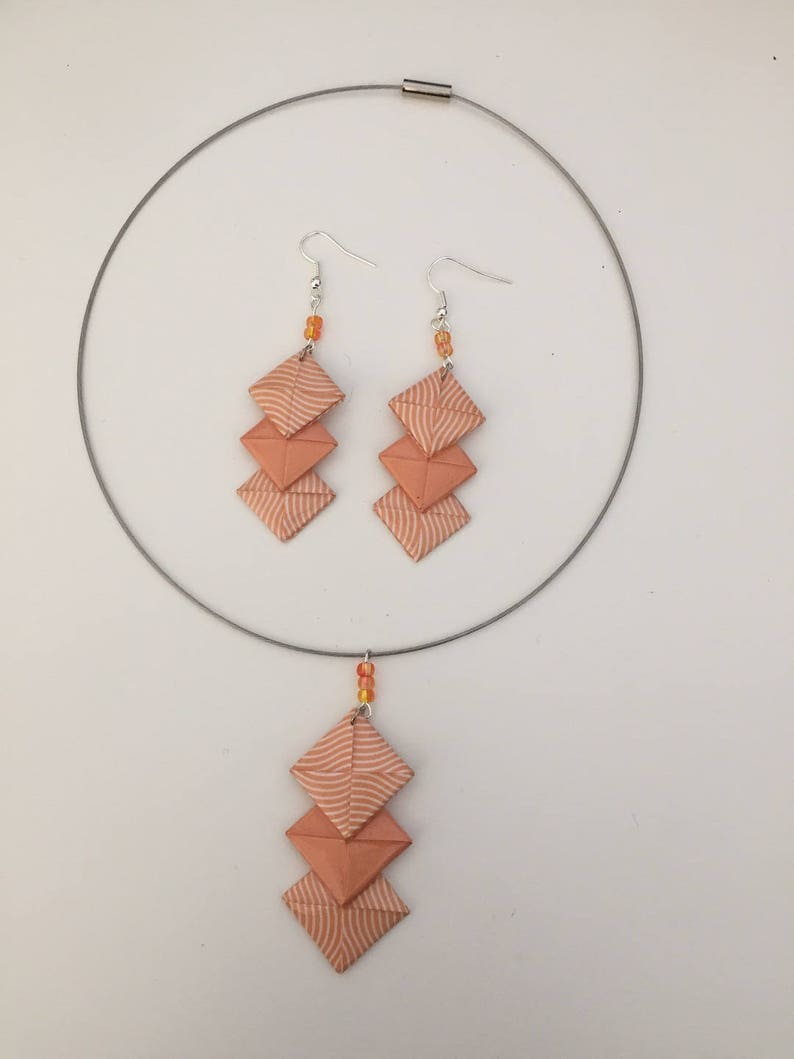 Matching earrings and necklace set in light orange and white origami paper