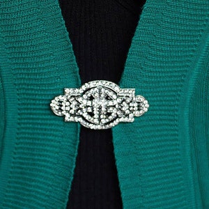 Spilla ClassicClip Cardigan Clip Lailina in cristallo argentato o cristallo nero o dorato e cristallo