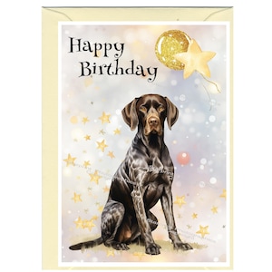 May include: A birthday card featuring a brown and white German Shorthaired Pointer dog sitting on a sparkly background with gold stars and a gold balloon. The card says "Happy Birthday".