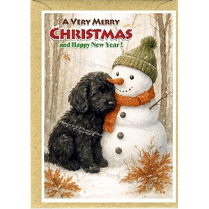 May include: A Christmas card showing a black puppy and a snowman in a snowy forest. The snowman has a green hat and orange scarf. The card reads "A Very Merry Christmas and Happy New Year!"