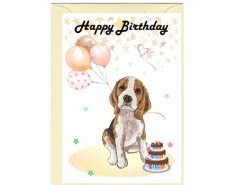 May include: A birthday card featuring a Beagle puppy with a pink, peach, and brown balloon string tied around its neck. The puppy is sitting next to a three-tiered cake with rainbow frosting and the words "Happy Birthday" are printed at the top of the card.