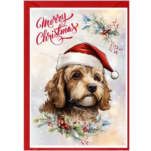 Puede incluir: Una tarjeta de Navidad con una ilustración de acuarela de un perro marrón y blanco con un gorro de Papá Noel rojo. El perro está rodeado de acebo verde y bayas rojas. El texto "Merry Christmas" está escrito en cursiva sobre el perro.