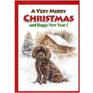 May include: A Christmas card featuring a brown dog sitting in the snow in front of a small wooden cabin. The card has the text "A Very Merry Christmas and Happy New Year!" on the top.