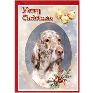 Puede incluir: Tarjeta de Navidad con borde rojo. Presenta un retrato de perro dentro de un marco ovalado. El perro tiene pelaje blanco y marrón. Las palabras "Merry Christmas" están en la parte superior, con adornos dorados y una ramita de bayas.