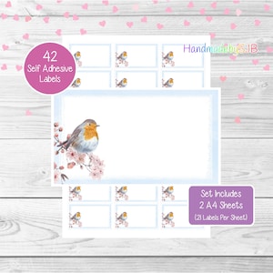 May include: A set of 42 self-adhesive labels featuring a watercolour illustration of a robin perched on a branch with pink blossoms. The labels are printed on two A4 sheets, with 21 labels per sheet. The text "HandmadebySJB" is printed in the top right corner of the image.