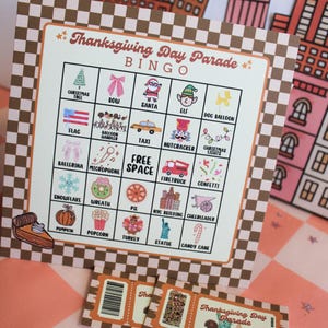 May include: A Thanksgiving Day Parade bingo card with a brown and white chequered border, featuring icons like a Christmas tree, Santa, and a taxi. Below, two rectangular tickets display the text Thanksgiving Day Parade and a barcode.