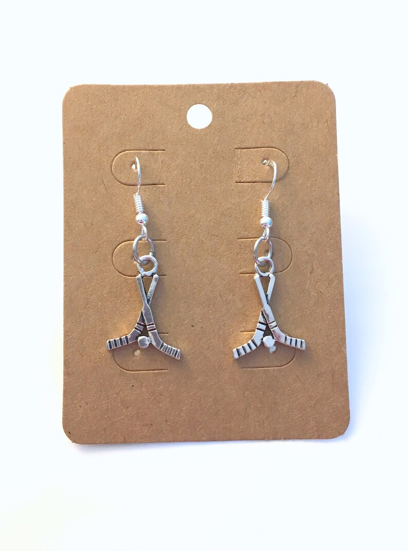 Sterling Silver Antiqued Hockey Player Charm