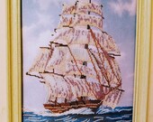Sailor Ship in Ocean. The Sailing Ship is made in cold shades. The Sails in white, blue and lilac colors, the plastic framed off-white