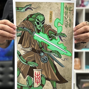 May include: A green humanoid figure with a green lightsaber and multiple snakes wrapped around its body. The figure is wearing a brown robe and has a green face. The background is a tan color with Japanese characters.