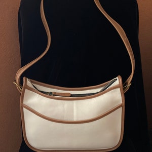 Two tone coach purse hotsell