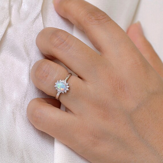 Sterling Silver Oval Created White Opal Halo Ring Sterling Silver Oval Created White Opal Halo Ring