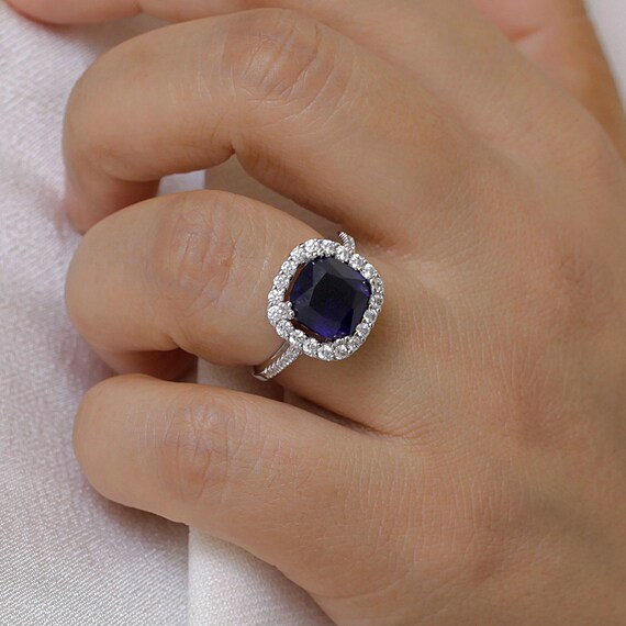 Sterling Silver Blue Cushion Square Created Opal and CZ Halo Ring Sterling Silver Blue Cushion Square Created Opal and CZ Halo Ring