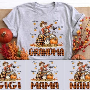 Könnte beinhalten: Hellgraues T-Shirt mit einem Herbstmotiv mit einer Vogelscheuche, Kürbissen und dem Wort "GRANDMA" in orangefarbenen Karobuchstaben. Namen sind über der Grafik aufgeführt. Herbst-Themenbekleidung.