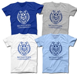 May include: Four t-shirts in different colors, blue, gray, white, and light blue, with a Monsters University logo printed on the front. The logo features a blue shield with a single eye, a book, and the letters "MU" inside. The shield is surrounded by a wreath of thorns and the text "Monsters University" and "2019" are printed below the shield.