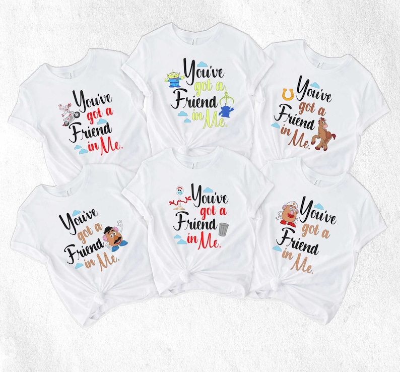 May include: Six white t-shirts with different Toy Story characters and the text "You've got a Friend in Me."