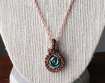 Copper wire wrapped necklace with iris hematite bead