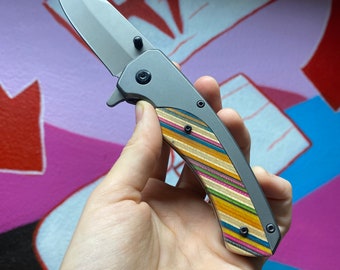 Skateboard pocket knife
