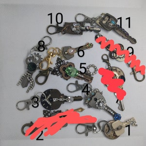 Upcycled and repurposed jewelry keychains/purse charms/ junk journal charms. Upcycled keychains, repurposed jewelry and keys into keychains