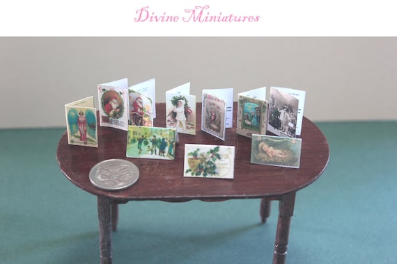 Sweet, tiny 1/12 scale vintage Christmas cards, have greetings and text inside.