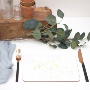 Yellow paint splatter melamine and cork backed placemat
