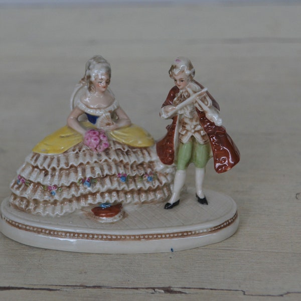 Antique German figurine in 18th century style, romantic couple